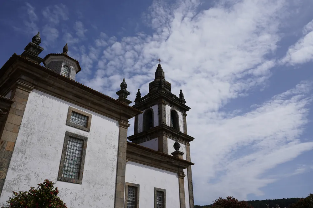 The chapel seen from the garden, with the bell tower on its axis.